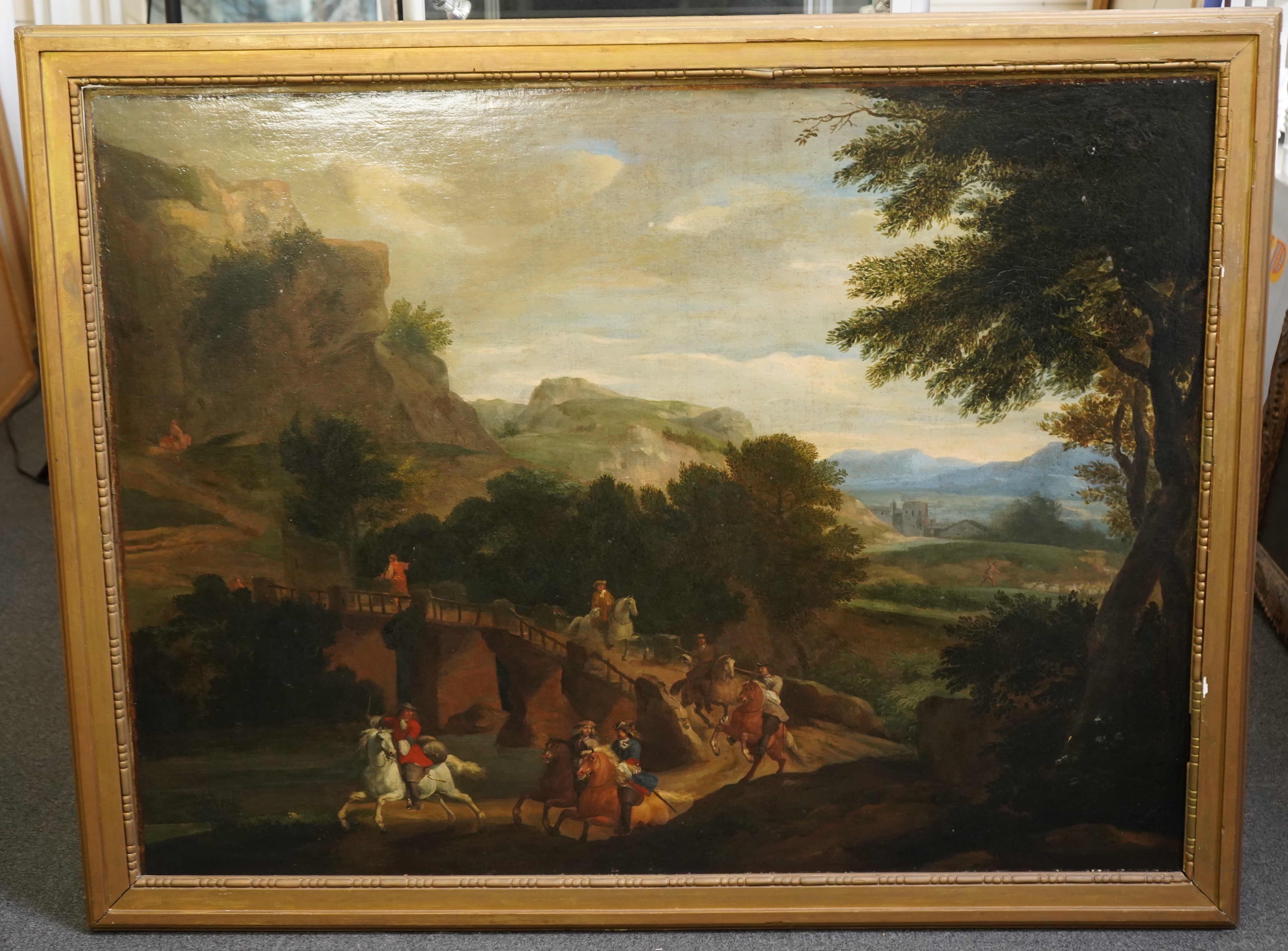 19th century Flemish School , 17th century style Italianate landscape with riders on a lane, oil on canvas, 56 x 129cm